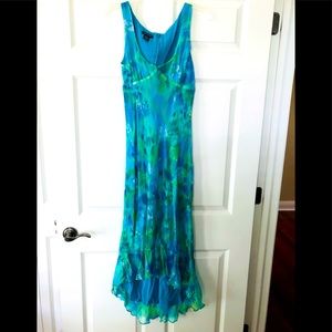 100% silk multi color dress with fishtail hem & matching bolero. Size 8